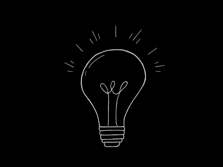 Bild Blog Coaching: Glühbirne mit strahlenden Linien, Symbol für Ideen und Inspiration.